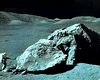 Apollo 17 geologist-astronaut Harrison Schmitt at the foot of a huge split boulder, December 13, …
[Credit: NASA]