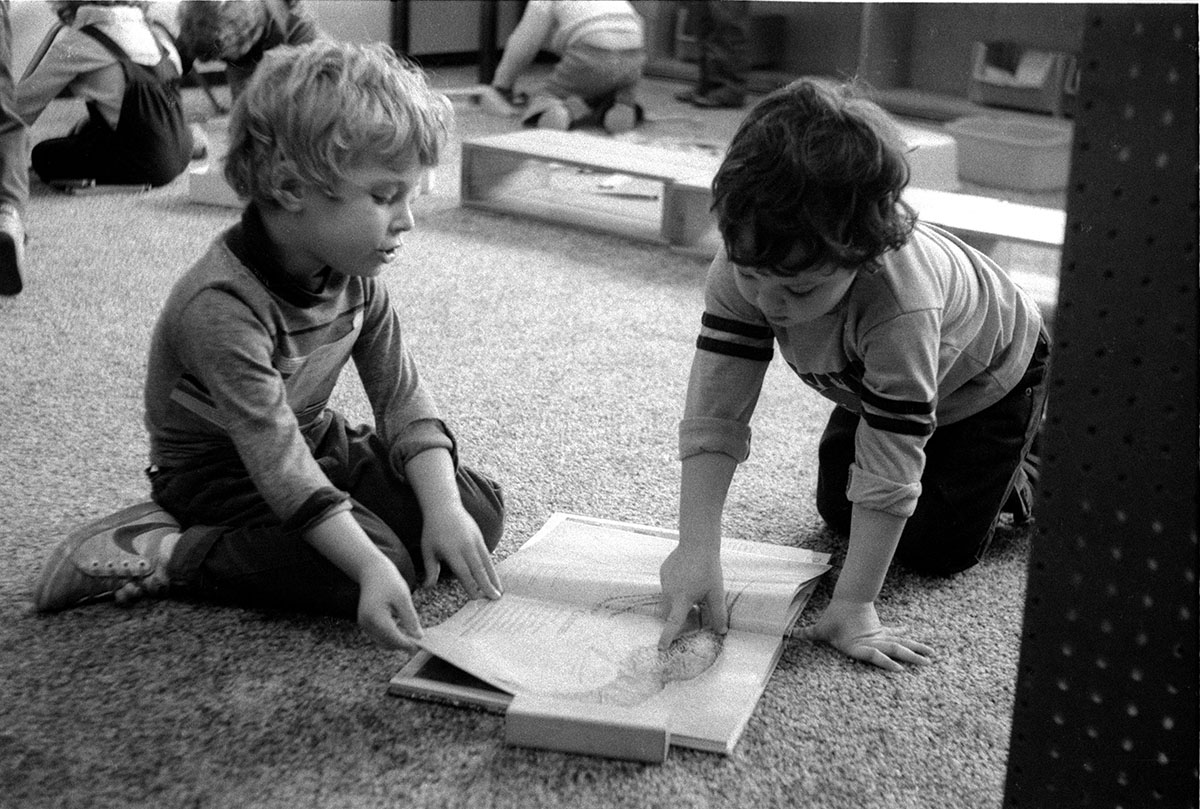 boys reading together