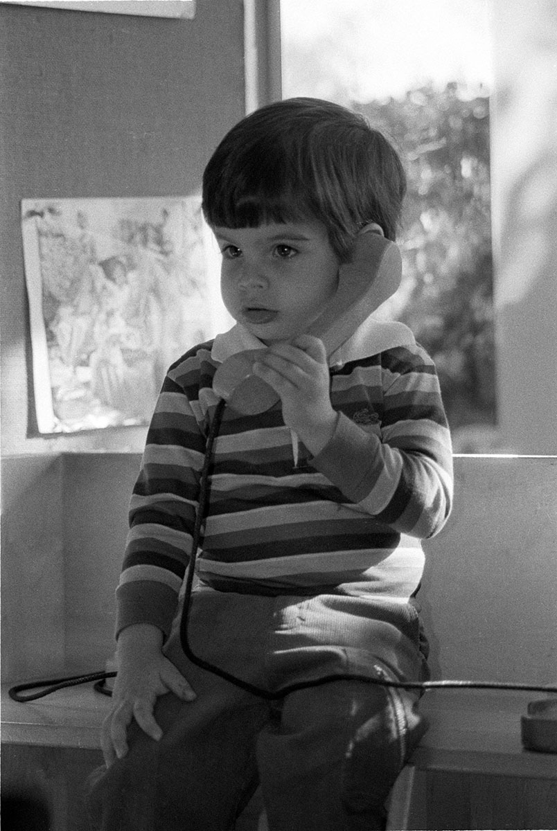 boy with play telephone