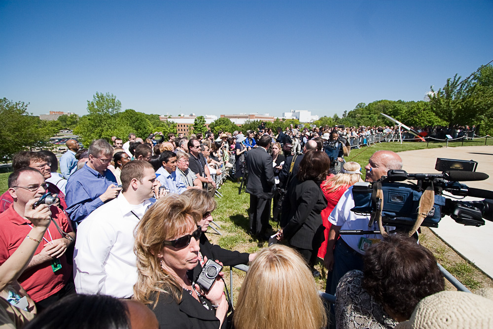 press and crowd at Visitor Center